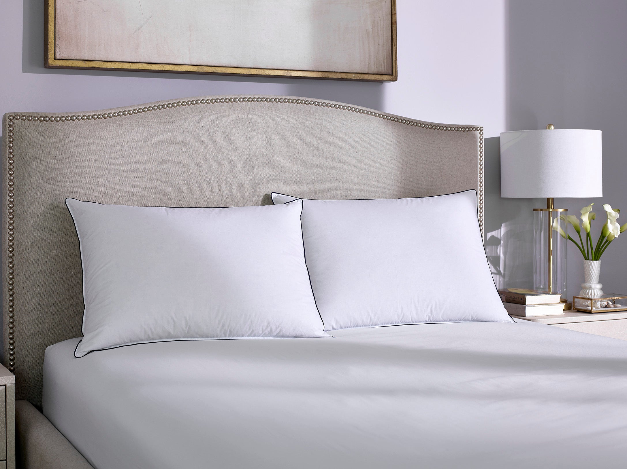Supportive Down Pillow against headboard
