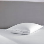 SmartGuard Pillow Protector on bed